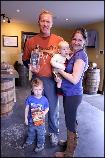 Meredith and Colin Schmidt shown here with their kids started the handcrafted Last Mountain Distillery. (Jenn Smith Nelson/Vacay.ca)