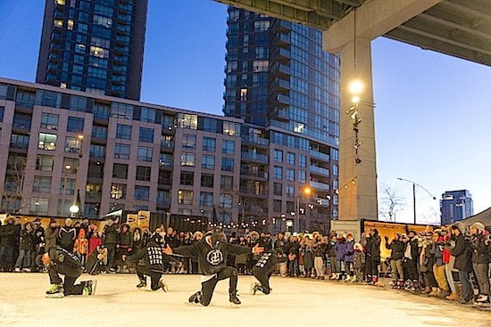 The Toronto Ice Skate Group performs on opening day at The Bentway Skate Trail - Andrew Williamson