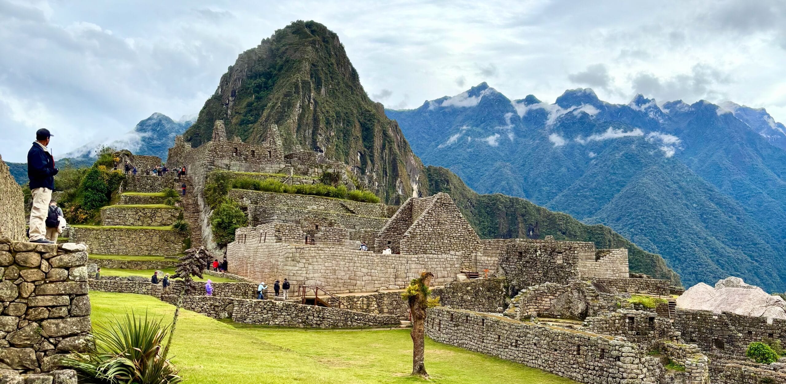 machu picchu man looking at mountain